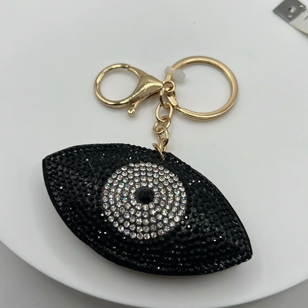 016. Black and Silver Eye Keychain with Rhinestones Gold Hardware